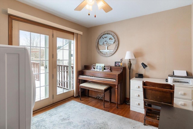 home office featuring ceiling fan and wood-type flooring