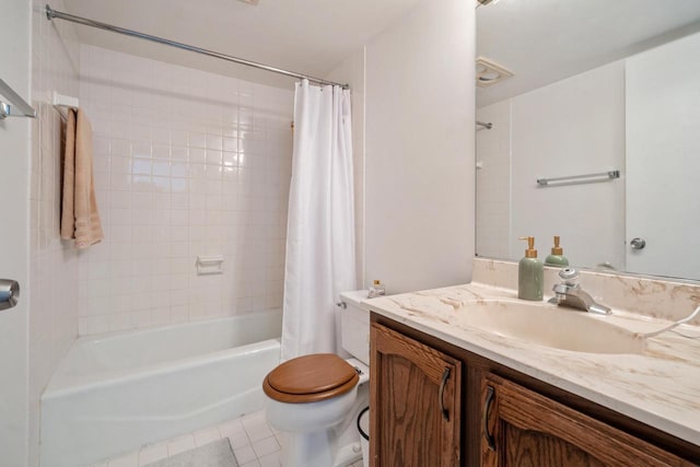 full bathroom featuring tile patterned floors, vanity, toilet, and shower / bath combination with curtain