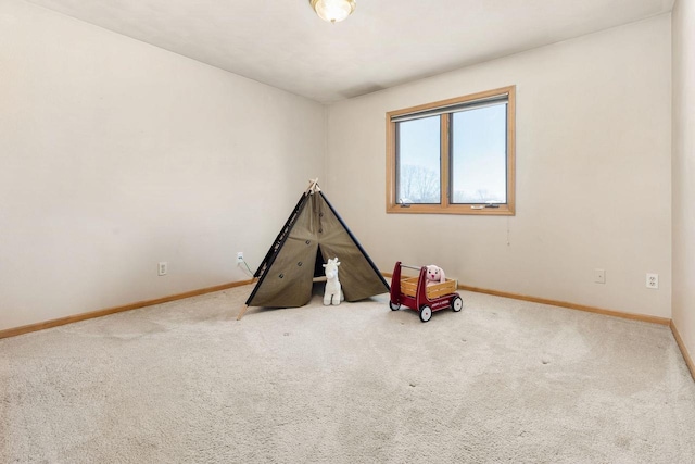 recreation room with carpet floors