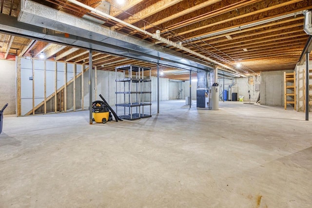 basement with heating unit and gas water heater