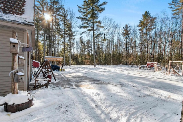 view of yard covered in snow