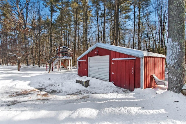 view of snow covered garage