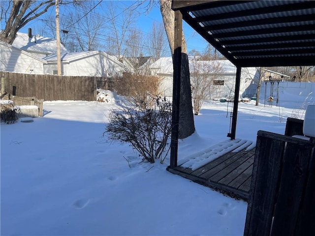 view of yard covered in snow