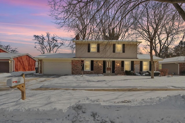 view of front of house with a garage