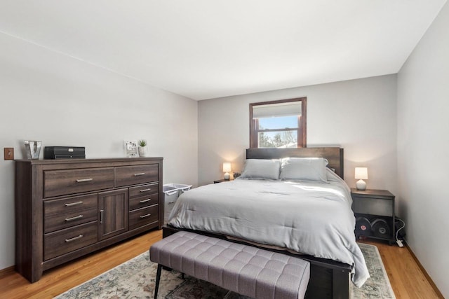 bedroom with light wood-type flooring