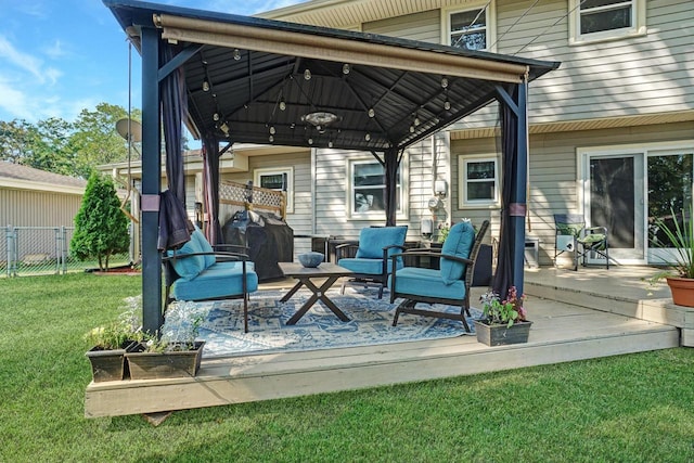 deck with a yard, a grill, and a gazebo