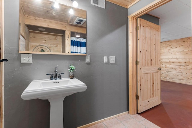 bathroom featuring tile patterned floors and sink