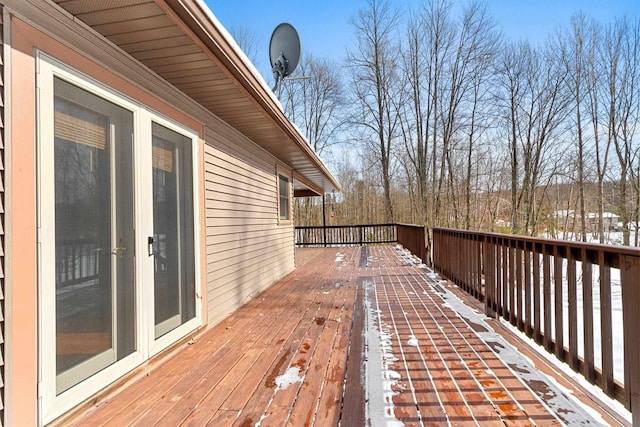 view of snow covered deck