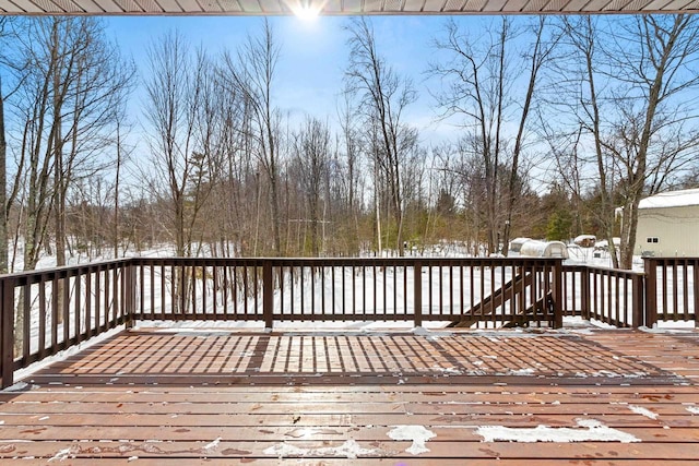 view of snow covered deck