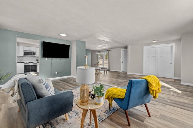 living room featuring light wood-type flooring