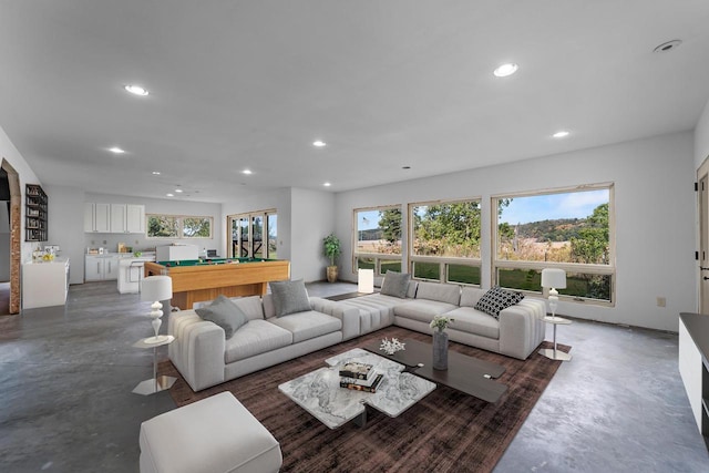 living room featuring pool table