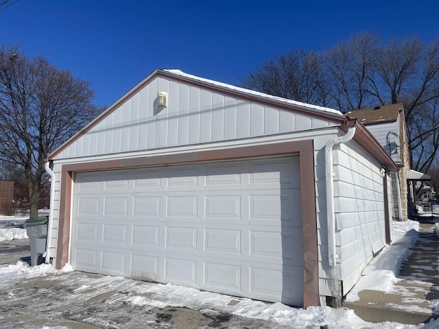 view of snow covered garage