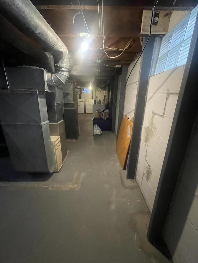 basement with separate washer and dryer