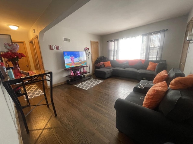 living room with wood-type flooring