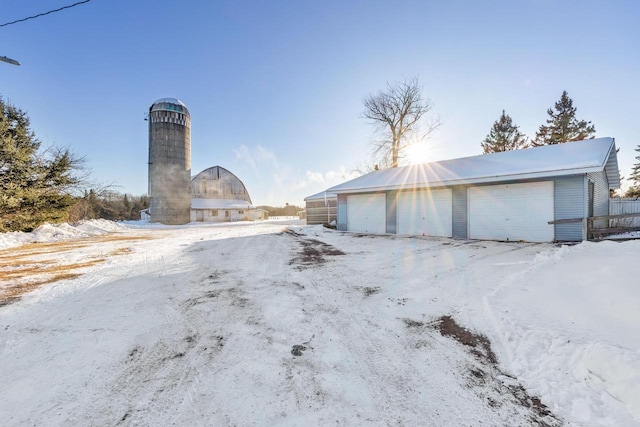 view of snow covered garage