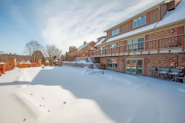 view of yard covered in snow