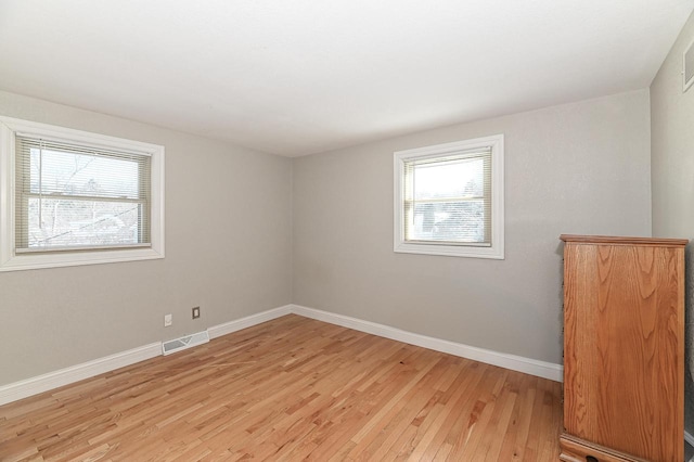 empty room featuring light hardwood / wood-style floors