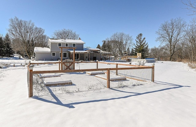 view of yard layered in snow