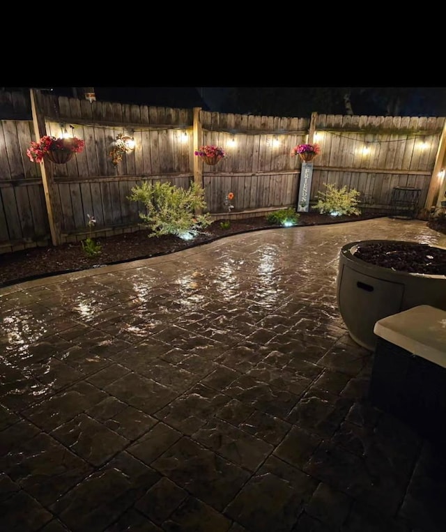 view of patio at night