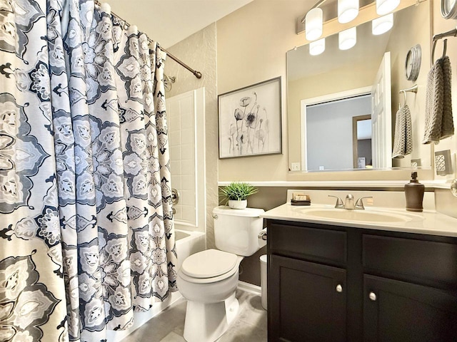 full bathroom with toilet, shower / bath combo with shower curtain, and vanity