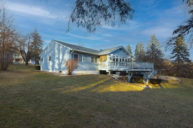 exterior space featuring a yard and a deck