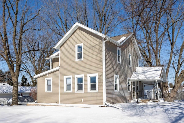 view of snow covered property