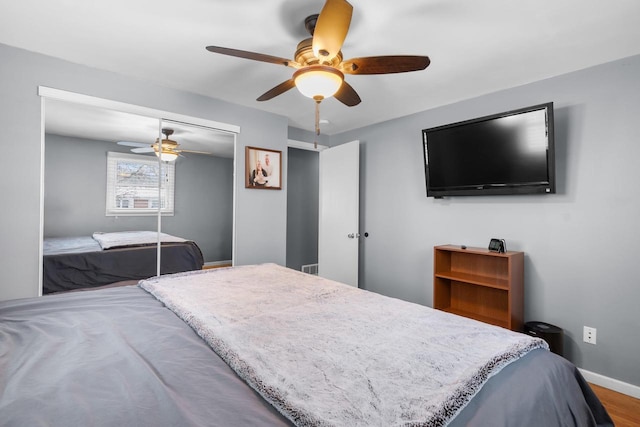 bedroom featuring a closet and ceiling fan