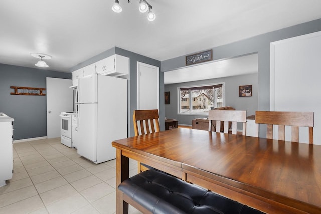 dining room with light tile patterned floors