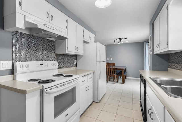 kitchen with white cabinetry, backsplash, white appliances, and light tile patterned flooring