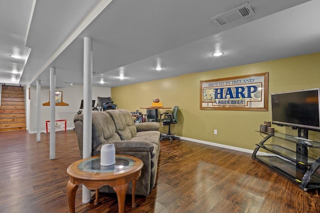 living room featuring dark hardwood / wood-style floors