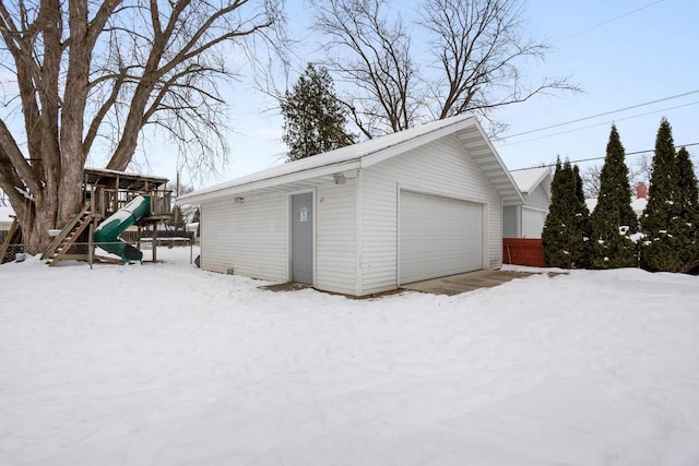 view of snow covered garage