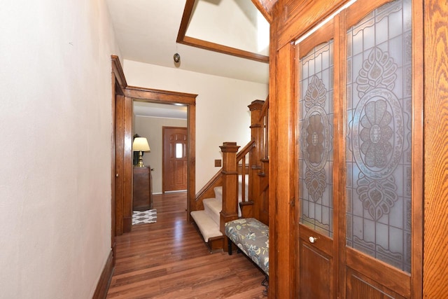 entrance foyer with dark hardwood / wood-style floors