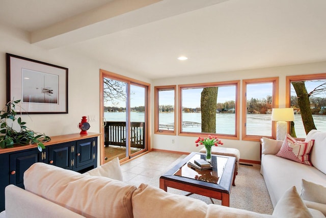 W5553 Oak Park Rd, Elkhorn, WI 53121 - living room with a water view, light tile patterned floors, and plenty of natural light