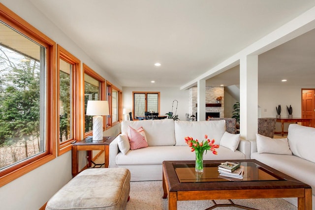 W5553 Oak Park Rd, Elkhorn, WI 53121 - sunroom / solarium featuring a fireplace and a wealth of natural light