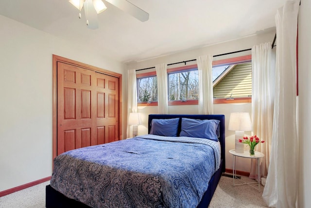 W5553 Oak Park Rd, Elkhorn, WI 53121 - carpeted bedroom with a closet and ceiling fan