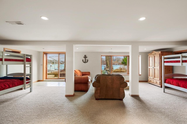 W5553 Oak Park Rd, Elkhorn, WI 53121 - carpeted bedroom featuring multiple windows and access to outside