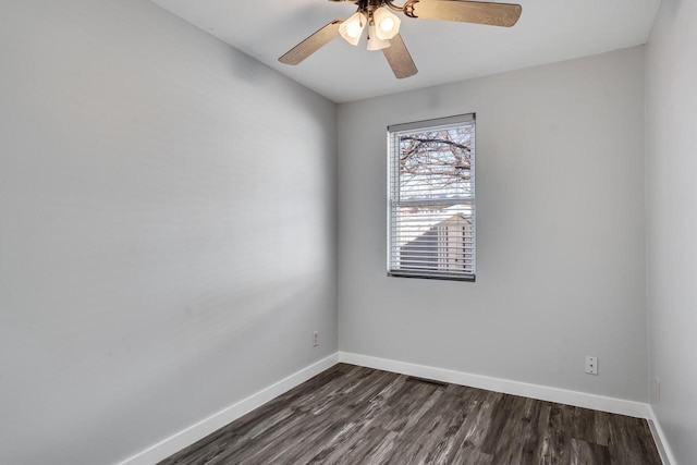 unfurnished room featuring ceiling fan and dark hardwood / wood-style flooring