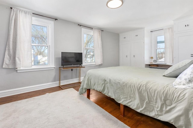 bedroom featuring hardwood / wood-style floors