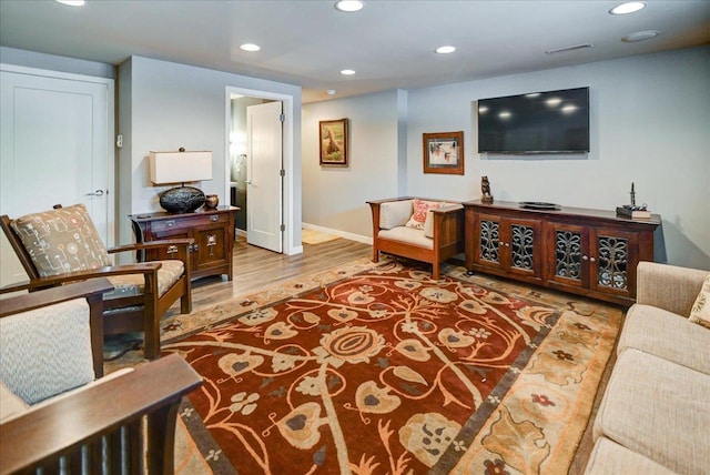 living room with light hardwood / wood-style floors