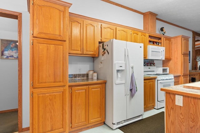 kitchen with white appliances and ornamental molding