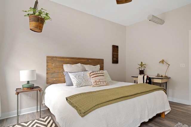 bedroom featuring wood-type flooring