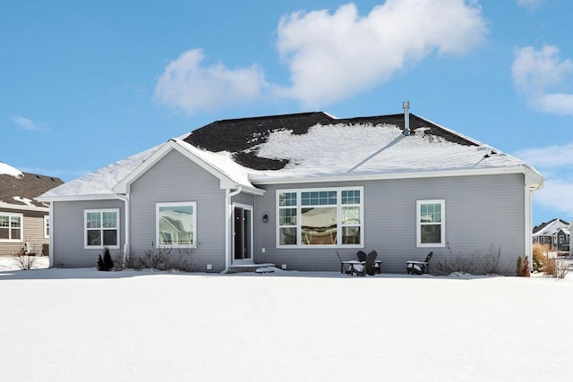 view of snow covered property