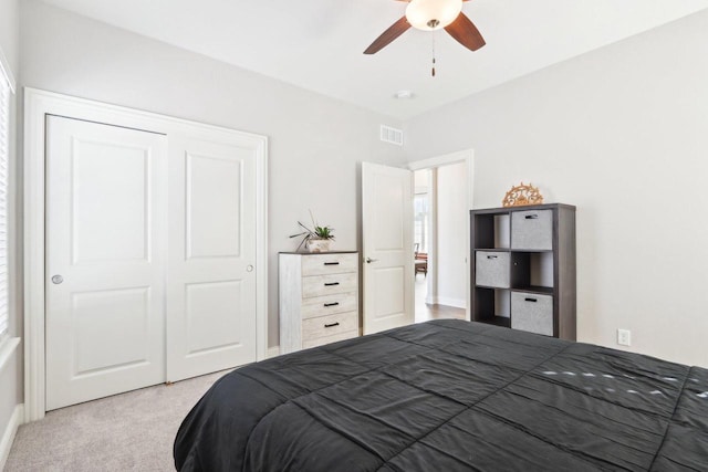 bedroom featuring carpet, visible vents, and ceiling fan