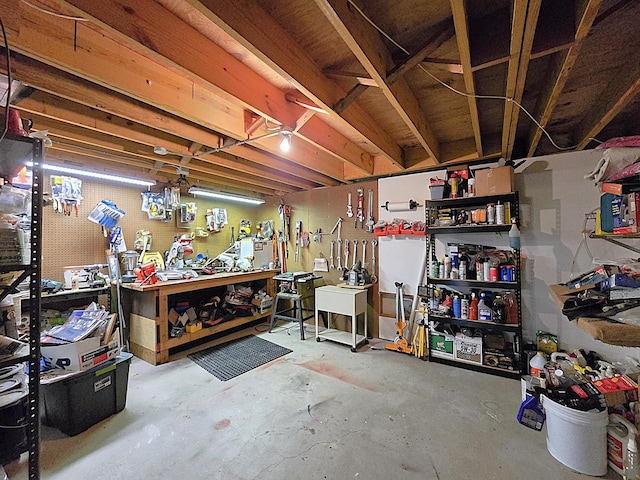 basement with a workshop area