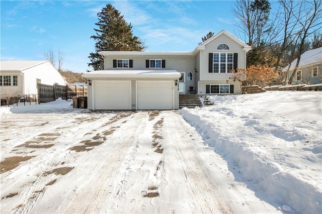 view of front of home with a garage