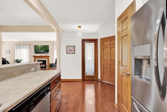 kitchen with light hardwood / wood-style floors and stainless steel appliances