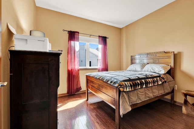 bedroom featuring hardwood / wood-style flooring