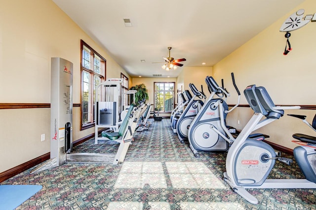 workout area featuring ceiling fan