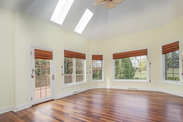 unfurnished sunroom with vaulted ceiling and visible vents