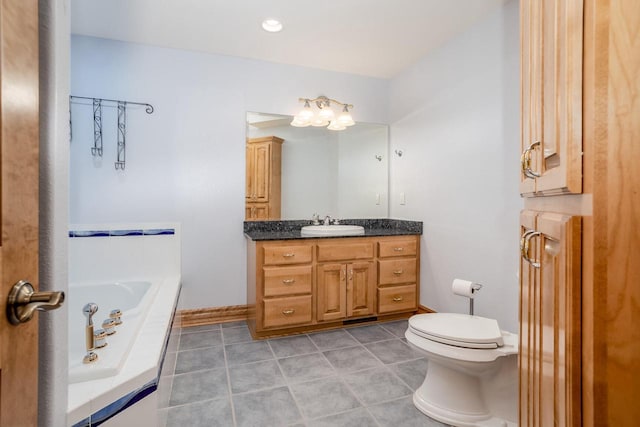 full bathroom with baseboards, toilet, tile patterned flooring, vanity, and a bath